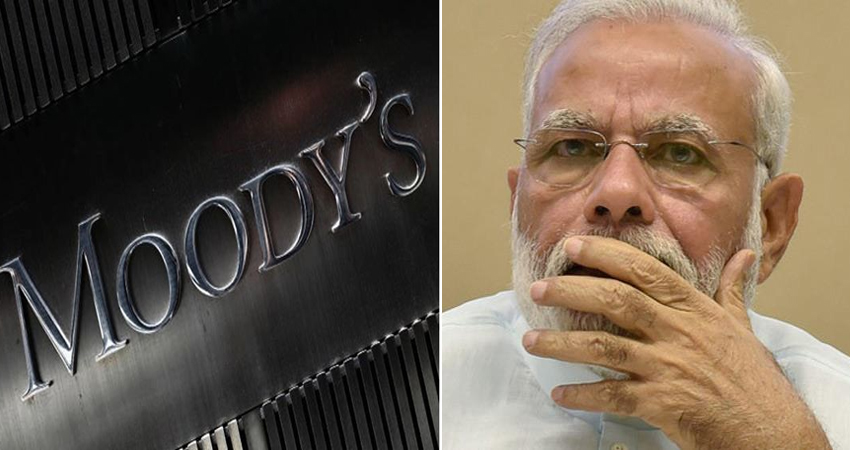 आर्थिक मोर्चे पर मोदी सरकार को झटका, Moody''s ने रेटिंग घटाकर ''स्टेबल'' से की ''नेगेटिव'' आर्थिक मोर्चे पर मोदी सरकार को झटका, Moody''s ने रेटिंग घटाकर ''स्टेबल'' से की ''नेगेटिव''